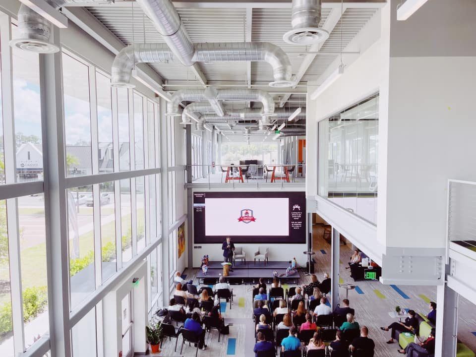 The Link's main lobby during a live event — the venue for Founder Fridays, The Forum, and AI Builders Guild sessions